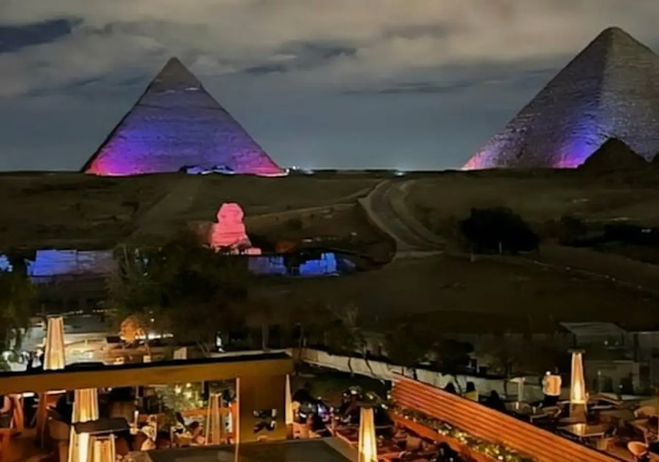 Dine at The Great Pyramid Inn with Pyramid views, a tasty meal, the Sound and Light Show, and hotel transfers included.